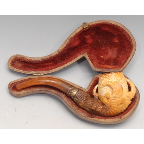 3108 - A German meerschaum pipe, carved as a dragon's claws, 12cm wide, early 20th century, cased