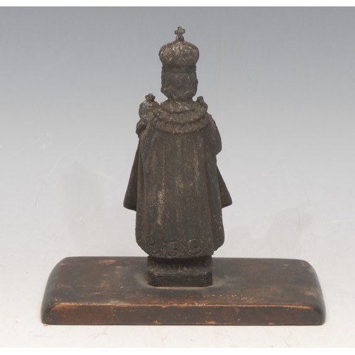 3064 - A cast metal ecclesiastical figure, The Infant Jesus Of Prague, wooden base, 13cm high