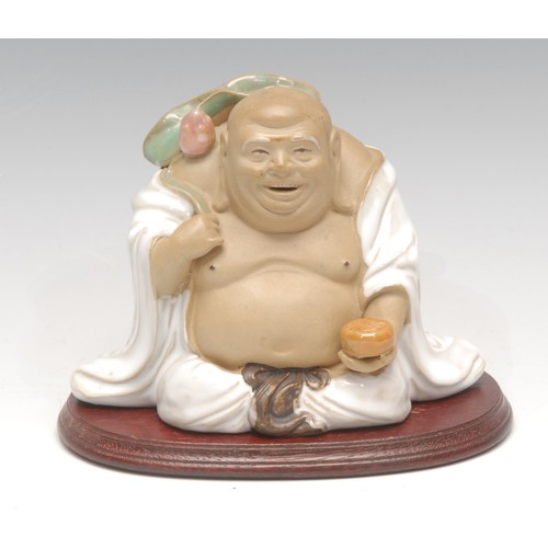 3074 - A Chinese pottery figure, of Budai, 15cm wide