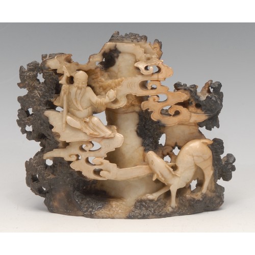 3078 - A Chinese soapstone carving, of Shou Lao and a deer, 16cm wide, early 20th century