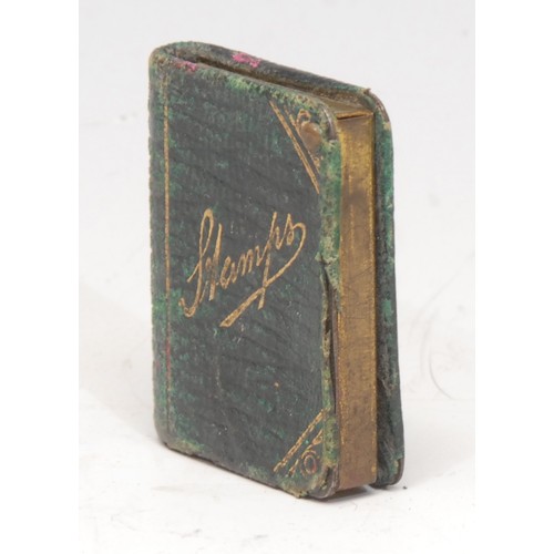 3139 - A late Victorian/Edwardian tooled and gilt morocco leather novelty stamp case, as a book, 3.5cm long... 