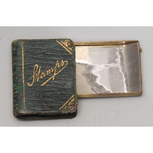 3139 - A late Victorian/Edwardian tooled and gilt morocco leather novelty stamp case, as a book, 3.5cm long... 