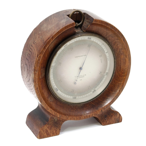 3384 - An early 20th century lacquered brass aneroid barometer, 11cm silvered register inscribed T Wheeler,... 