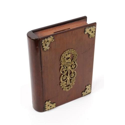 3130 - A late 19th century gilt metal mounted mahogany disguise volume novelty money box, as a book, the sp... 