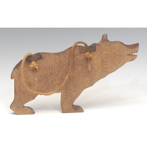 3057 - A Black Forest novelty wall-hanging key hook, as a bear, 24cm long, early 20th century