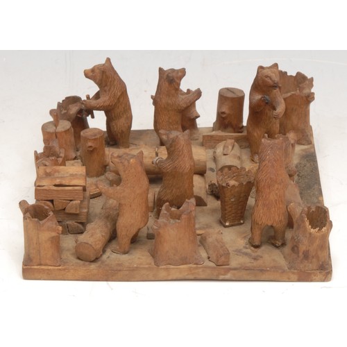 3060 - A Black Forest tableau, of bears at work in a woodyard, 13.5cm wide, c.1900