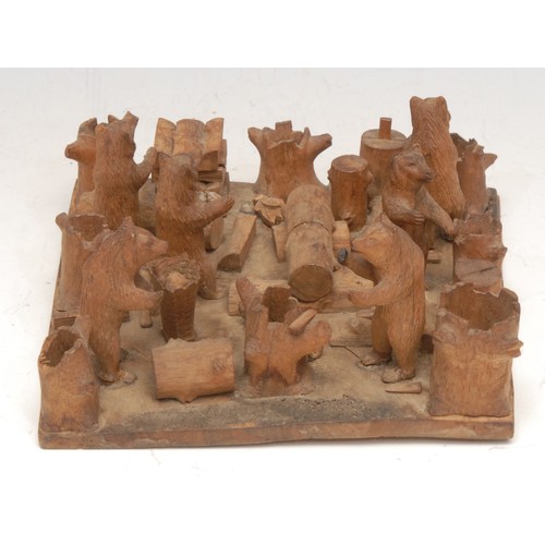 3060 - A Black Forest tableau, of bears at work in a woodyard, 13.5cm wide, c.1900