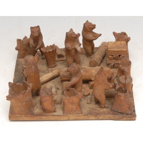 3060 - A Black Forest tableau, of bears at work in a woodyard, 13.5cm wide, c.1900