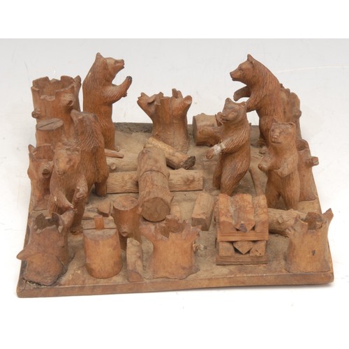 3060 - A Black Forest tableau, of bears at work in a woodyard, 13.5cm wide, c.1900