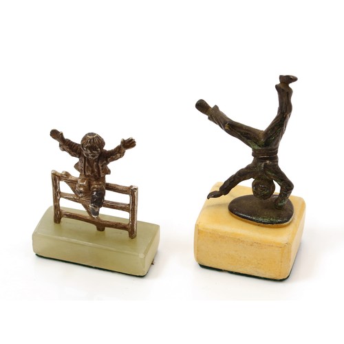 3084 - A Continental cabinet bronze, of a young acrobat, Sienna marble base, 8cm high; a silver cabinet mod... 