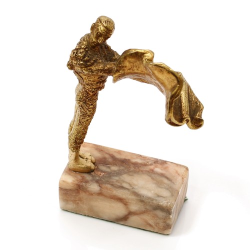 3242 - Bullfighting - a gilt cabinet bronze, of a matador, marble base, 11cm high