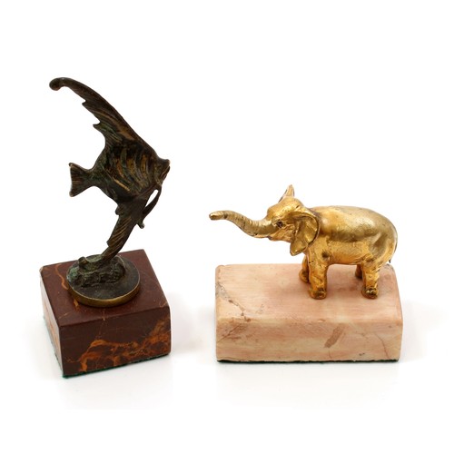 3087 - A Continental gilt cabinet model, of an elephant, rectangular marble base, 6.5cm long; another, of a... 