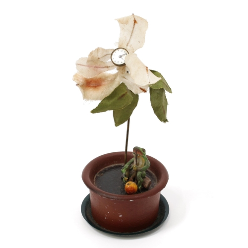 3085 - A Continental cold painted metal mystery clock type novelty timepiece, as a flower in a pot, a 1.5cm... 