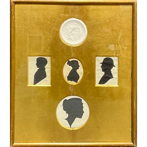 3301 - Irish School (19th century), an arrangement of cut paper silhouettes, indistinctly signed with initi... 