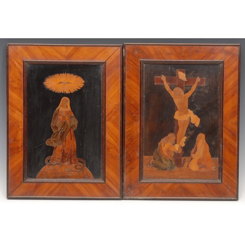 3159 - A pair of Italian walnut and marquetry rectangular panels, inlaid with The Crucifixion and The Bless... 