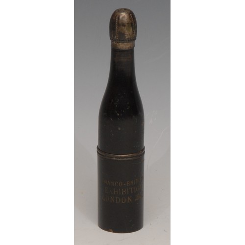 3210 - An early 20th century novelty pipe, as a bottle, inscribed Franco-British Exhibition London 1908, 13... 