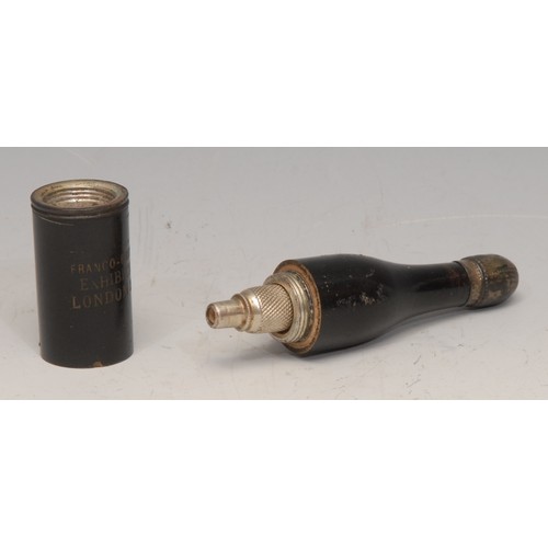 3210 - An early 20th century novelty pipe, as a bottle, inscribed Franco-British Exhibition London 1908, 13... 