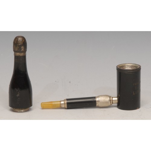 3210 - An early 20th century novelty pipe, as a bottle, inscribed Franco-British Exhibition London 1908, 13... 