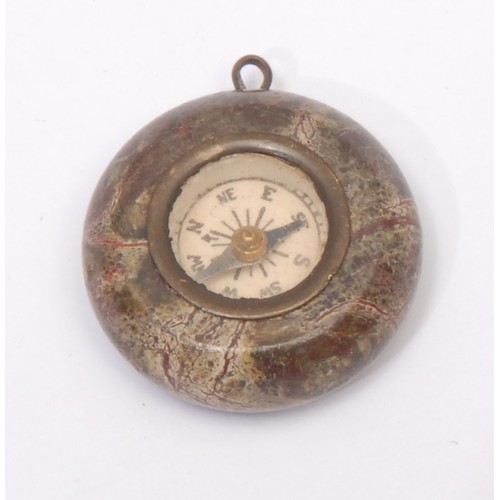 3248 - An early 20th century Cornish serpentine miniature compass, 3cm diam; another, similar, smaller; ano... 