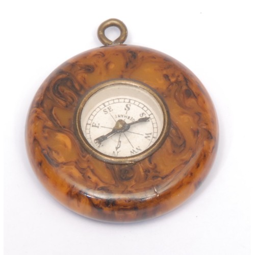 3248 - An early 20th century Cornish serpentine miniature compass, 3cm diam; another, similar, smaller; ano... 