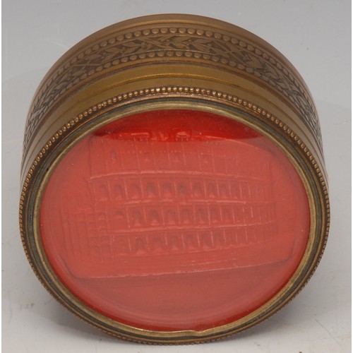 3088 - A Continental gilt metal circular snuff box, the push-fitting cover mounted with an intaglio impress... 