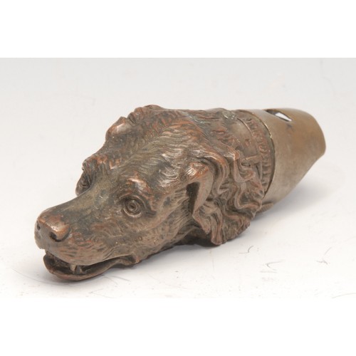 3131 - A late 19th century novelty combination vesta case and whistle, as the head of a dog, 9cm long, c.18... 