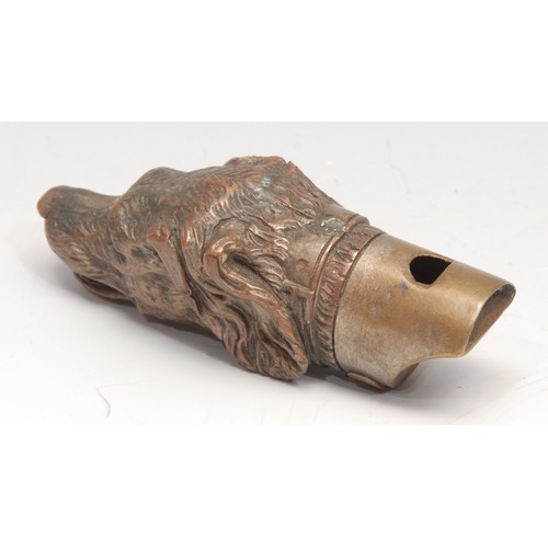 3131 - A late 19th century novelty combination vesta case and whistle, as the head of a dog, 9cm long, c.18... 