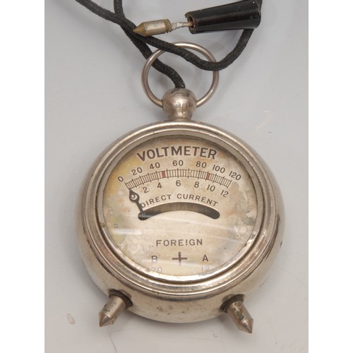 3386 - An early 20th century pocket voltmeter, 8.5cm over loop; an amp meter, etc (4)