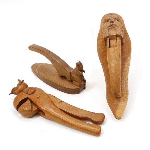 3590 - Nutcrackers - an oak novelty cross-over lever-action nut cracker, carved with a bird, in the manner ... 