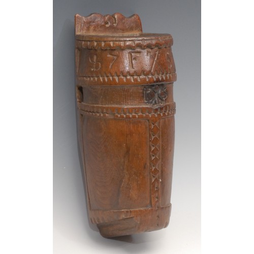 3353 - Treen - an 18th century Scandinavian candle box or wall pocket, chip carved, 26.5cm long, dated 1777