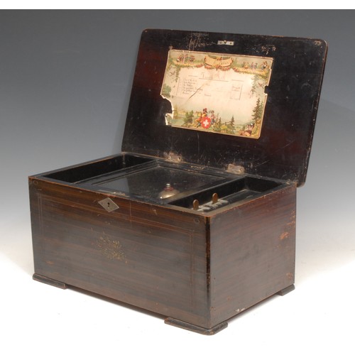 3040 - A 19th century Swiss rosewood and marquetry rounded rectangular bells-in-sight orchestral music box,... 