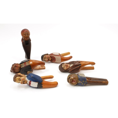 3587 - Nutcrackers - an Italian lever-action novelty nut cracker, carved and painted as a gentleman in trad... 