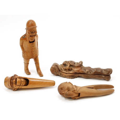 3593 - Nutcrackers - an unusual early 20th century novelty lever-action nut cracker, carved as the head of ... 