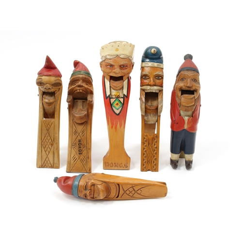 3550 - Nutcrackers - a Scandinavian novelty lever-action nut cracker, carved and painted as the head of a b... 