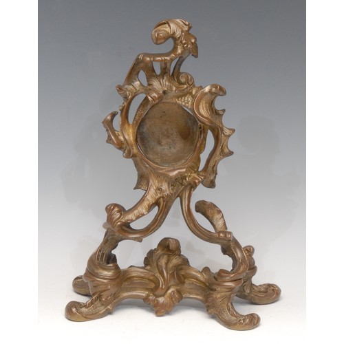 3173 - A substantial 19th century gilt bronze pocket watch stand, cast in the Rococo taste with scrolling a... 