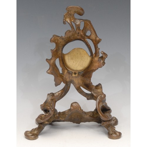 3173 - A substantial 19th century gilt bronze pocket watch stand, cast in the Rococo taste with scrolling a... 