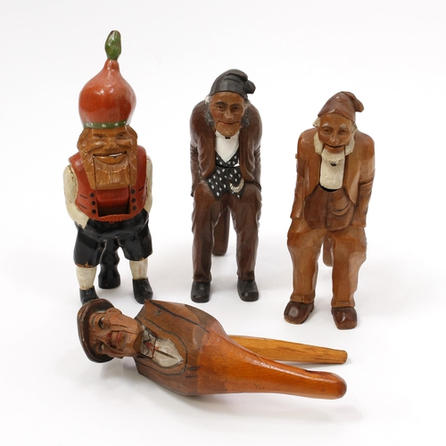 3588 - Nutcrackers - an Italian novelty lever-action figural nut cracker, carved and polychrome painted as ... 