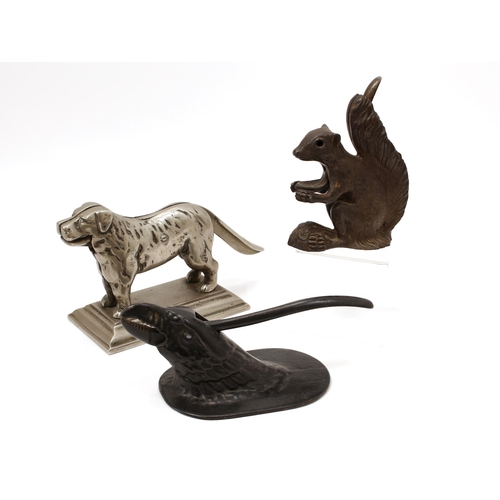 3532 - Nutcrackers - a Canadian cast alloy novelty lever-action nut cracker, as a dog, manufactured by Crow... 