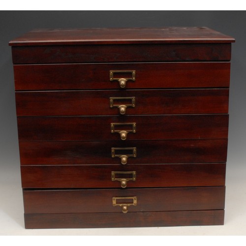 3140 - A mahogany table top collector's cabinet, rectangular oversailing top above six drawers, each compar... 