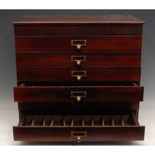 3140 - A mahogany table top collector's cabinet, rectangular oversailing top above six drawers, each compar... 