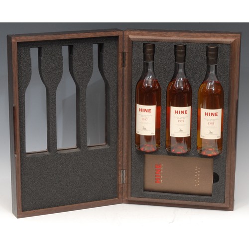 3415 - A presentation set of three 20cl bottles, Hine Grand Champagne Cognac, 1957, 1975 and 1981, wooden s... 