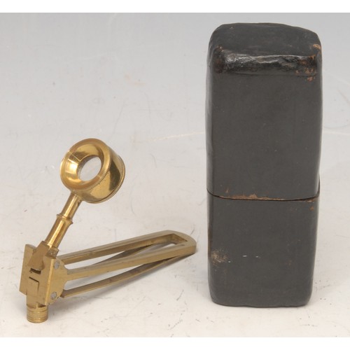 3373 - A 19th century brass pocket field microscope, folding for travel, 6.5cm long, cased