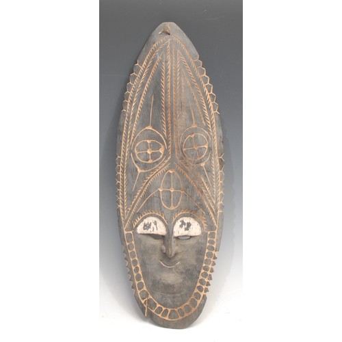 3439 - Tribal Art and the Eclectic Interior - a Papua New Guinea mask, carved with crocodile (pukpuk) image... 