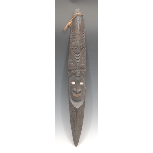 3439 - Tribal Art and the Eclectic Interior - a Papua New Guinea mask, carved with crocodile (pukpuk) image... 