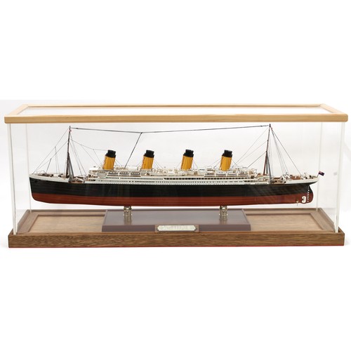 3141 - A maritime model ship, RMS Titanic, 1/350th scale, hand painted, cased, 83cm wide overall