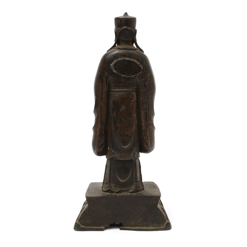 3245 - Chinese School (17th/18th century), a dark patinated bronze, of a Daoist Immortal, traces of gilding... 