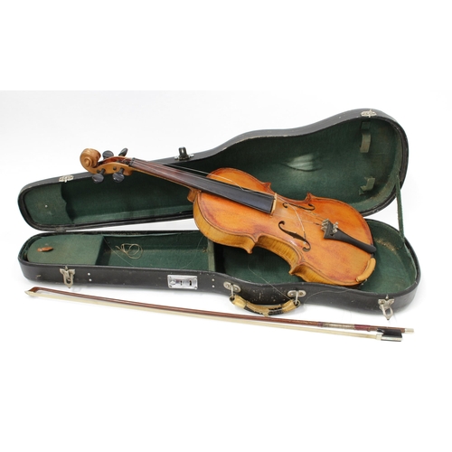 3370 - A violin, the two-piece back 36.5cm excluding button, ebonised tuning pegs, outlined throughout with... 