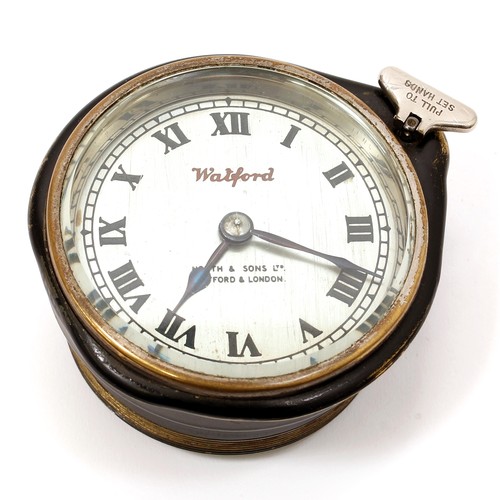 3239 - Automobilia - a vintage car dashboard timepiece, 7.5cm silvered clock dial, inscribed Watford, North... 