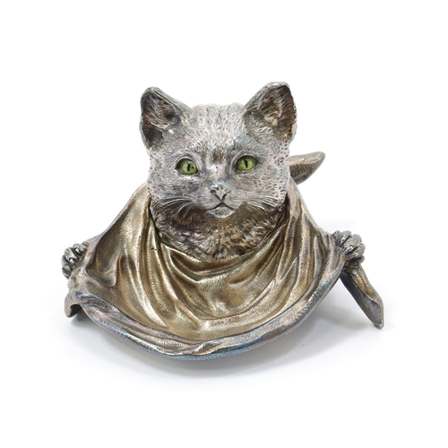 3171 - A silver plated novelty inkwell, as a cat wearing a bib, enamel eyes, hinged cover, 13.5cm wide