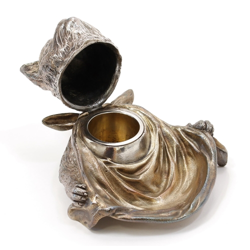 3171 - A silver plated novelty inkwell, as a cat wearing a bib, enamel eyes, hinged cover, 13.5cm wide